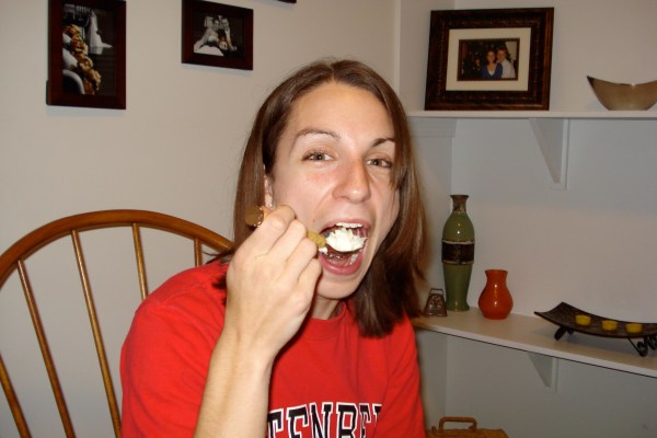 Sarah eating cake.