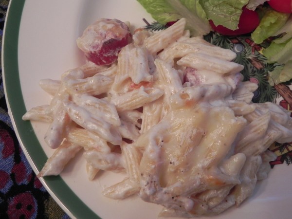 Baked Rigatoni with Bechamel Sauce... a family favorite baked pasta made with turkey smoked sausage & fontina cheese!