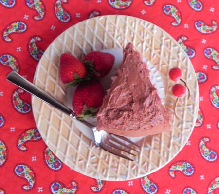 Fresh strawberry cake from scratch... no Jello, artificial flavorings, or anything fake! This cake is delicious and easier than you would think! Top it with a rich chocolate frosting and you have Chocolate Covered Strawberry Cake that everyone will want an extra slice...or two...or three of!