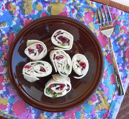 Cranberry Feta Pinwheels are fuss-free and amazing. They should be made ahead so that their flavors have a chance to meld, and so their sweet, tangy, creamy, and salty nature can shine through. 
