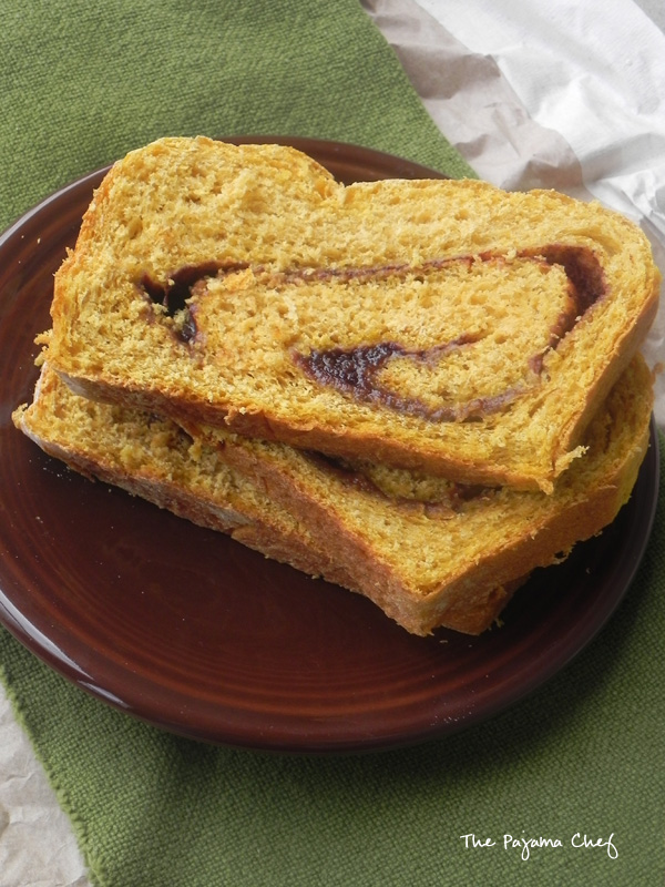 Pumpkin Cinnamon Swirl Bread - soft, fluffy cinnamon swirl bread made with fall's favorite flavor! via thepajamachef.com #pumpkin #recipe #bread #baking