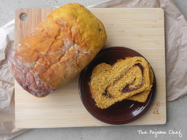 Pumpkin Cinnamon Swirl Bread - soft, fluffy cinnamon swirl bread made with fall's favorite flavor! via thepajamachef.com #pumpkin #recipe #bread #baking