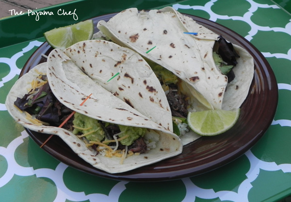 Crockpot Barbacoa - an easy way to fancy up your next taco night! Find the recipe on thepajamachef.com #secretrecipeclub #src