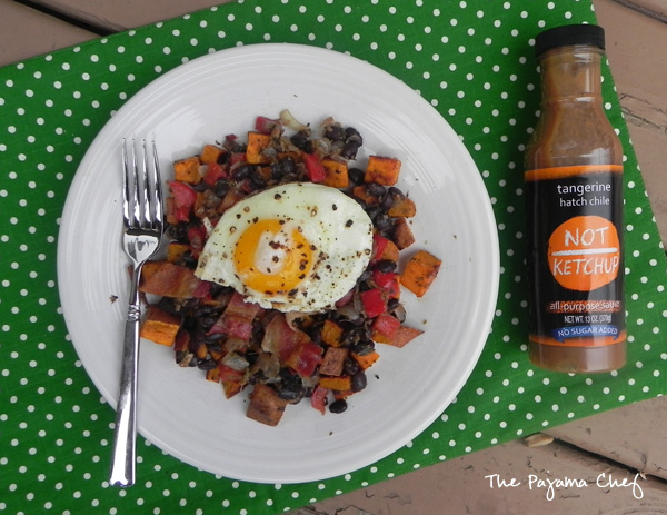 This sweet potato hash combines pretty much all my favorite things... sweet potatoes, black beans, red peppers, bacon, and fried eggs. Ginger and grapefruit zest give it an unforgettable special tangy flavor! #FreshTastyValentines