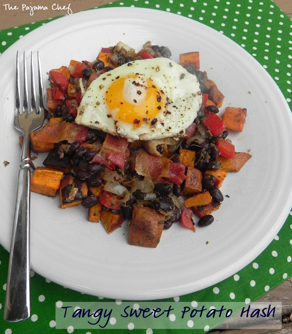This sweet potato hash combines pretty much all my favorite things... sweet potatoes, black beans, red peppers, bacon, and fried eggs. Ginger and grapefruit zest give it an unforgettable special tangy flavor! #FreshTastyValentines