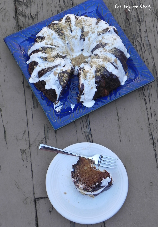 This incredible S'mores Bundt Cake is made with graham cracker crumbs--no flour--and is so delicious you won't be able to stop at just one slice! You'll always want "s'more!" Hahaha. But seriously, even though it's super rich, you will. :) #secretrecipeclub