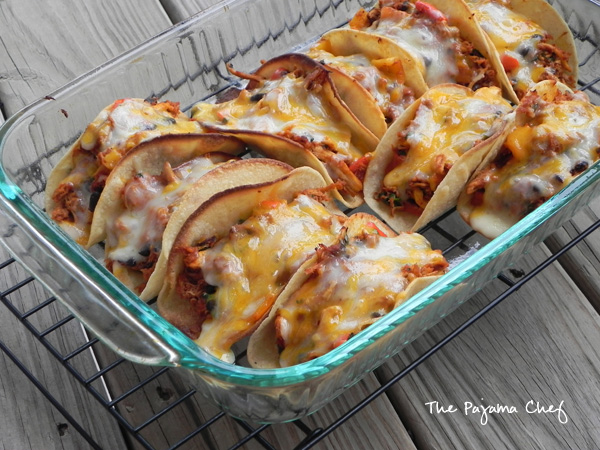 You'll love these crispy, melty baked tacos! The filling is made from both beef and beans, so it's extra delicious! :)