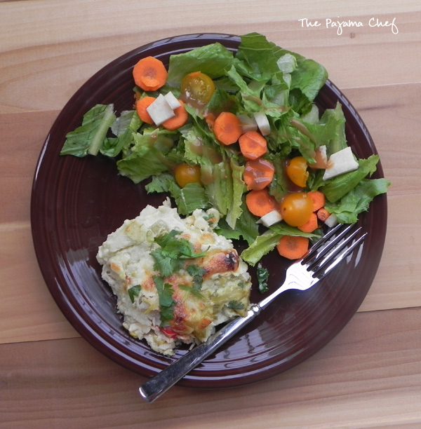 Cheesy, bubbly layered chicken enchiladas--so comforting and delicious. This dinner is super easy and can be made ahead or even frozen. Recipe from Shauna Niequist's Bread and Wine!
