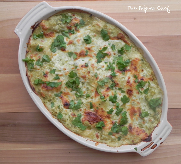 Cheesy, bubbly layered chicken enchiladas--so comforting and delicious. This dinner is super easy and can be made ahead or even frozen. Recipe from Shauna Niequist's Bread and Wine!