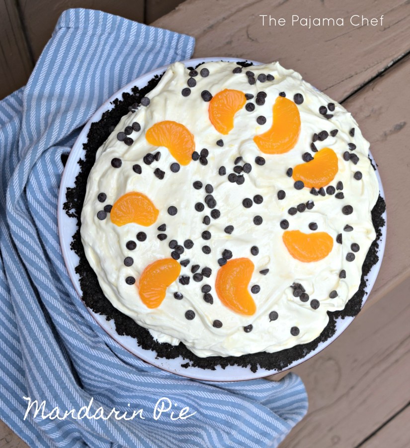A creamy, dreamy mandarin orange pie made with an Oreo crust and topped off with mini chocolate chips... this cool treat is perfect for hot nights. #CookoutWeek 2017