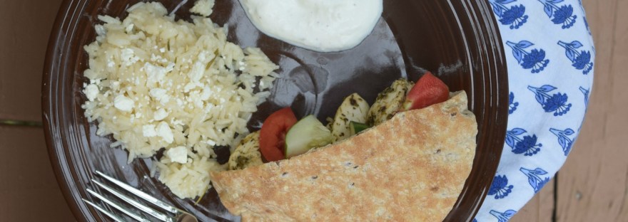 Chicken gyros--baked in the oven--are a wonderful weeknight dinner option! Lemony yogurt sauce makes these tender herbed chicken strips even more amazing. These gyros are great served with pita, rice, and lots of fresh veggies.