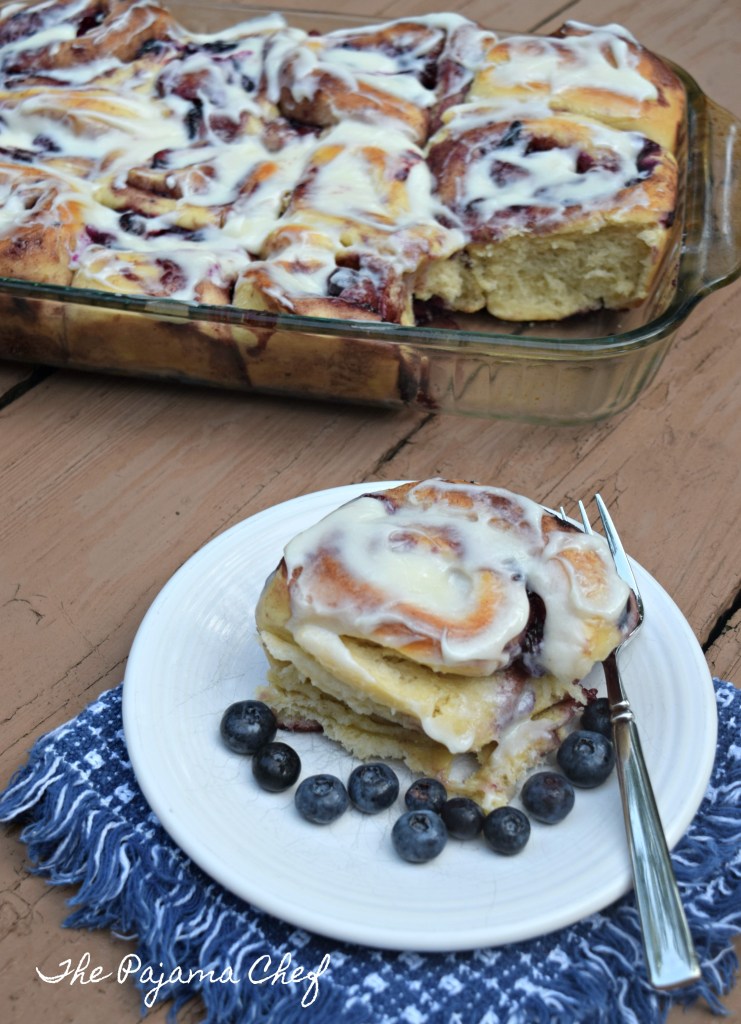 If you love cinnamon rolls, and you love blueberries, you NEED TO MAKE THIS RECIPE! Recipe for Blueberry Sweet Rolls on thepajamachef.com @thepajamachef