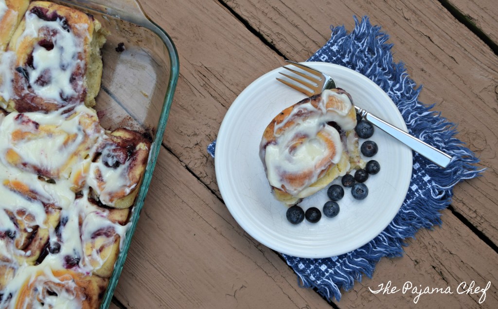 If you love cinnamon rolls, and you love blueberries, you NEED TO MAKE THIS RECIPE! Recipe for Blueberry Sweet Rolls on thepajamachef.com @thepajamachef