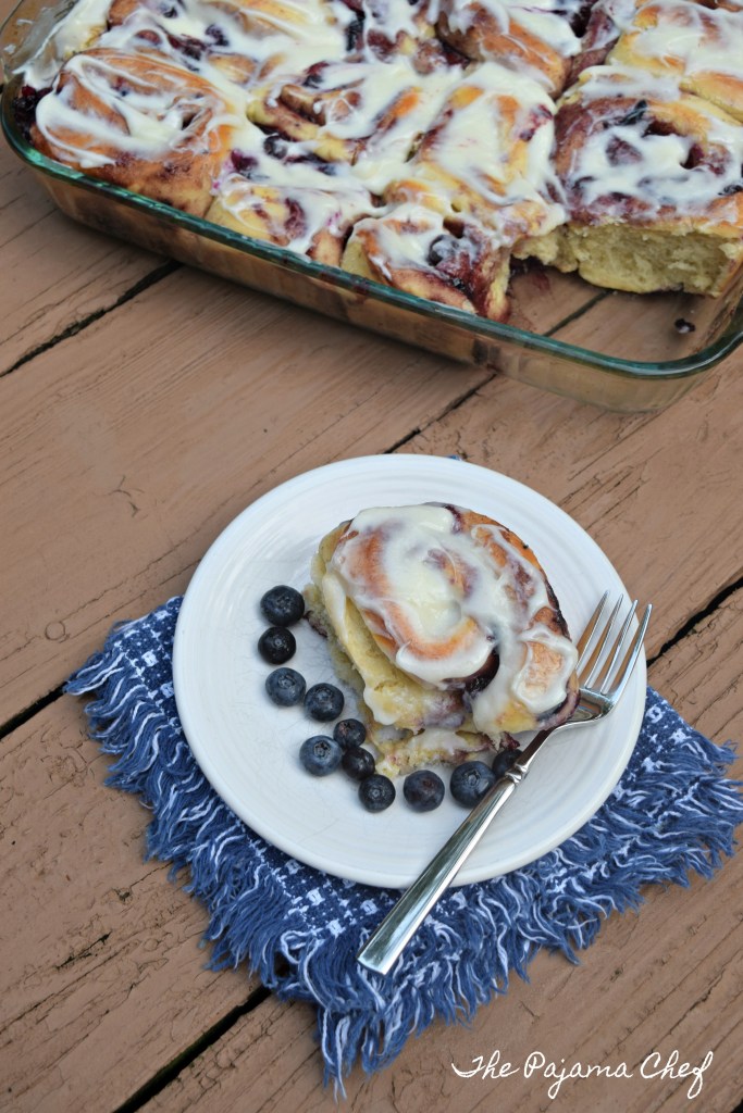 If you love cinnamon rolls, and you love blueberries, you NEED TO MAKE THIS RECIPE! Recipe for Blueberry Sweet Rolls on thepajamachef.com @thepajamachef