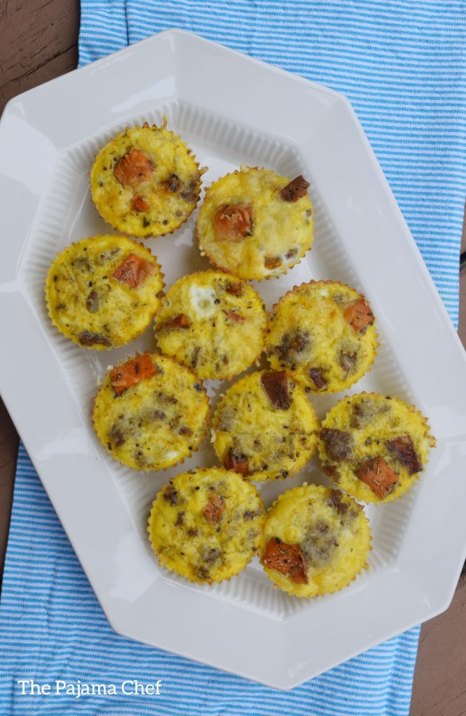 Layered sweet potato and sausage scrambled egg muffins to make your mornings better! These little treats are so flavorful and delicious. They're toddler approved and freeze great!