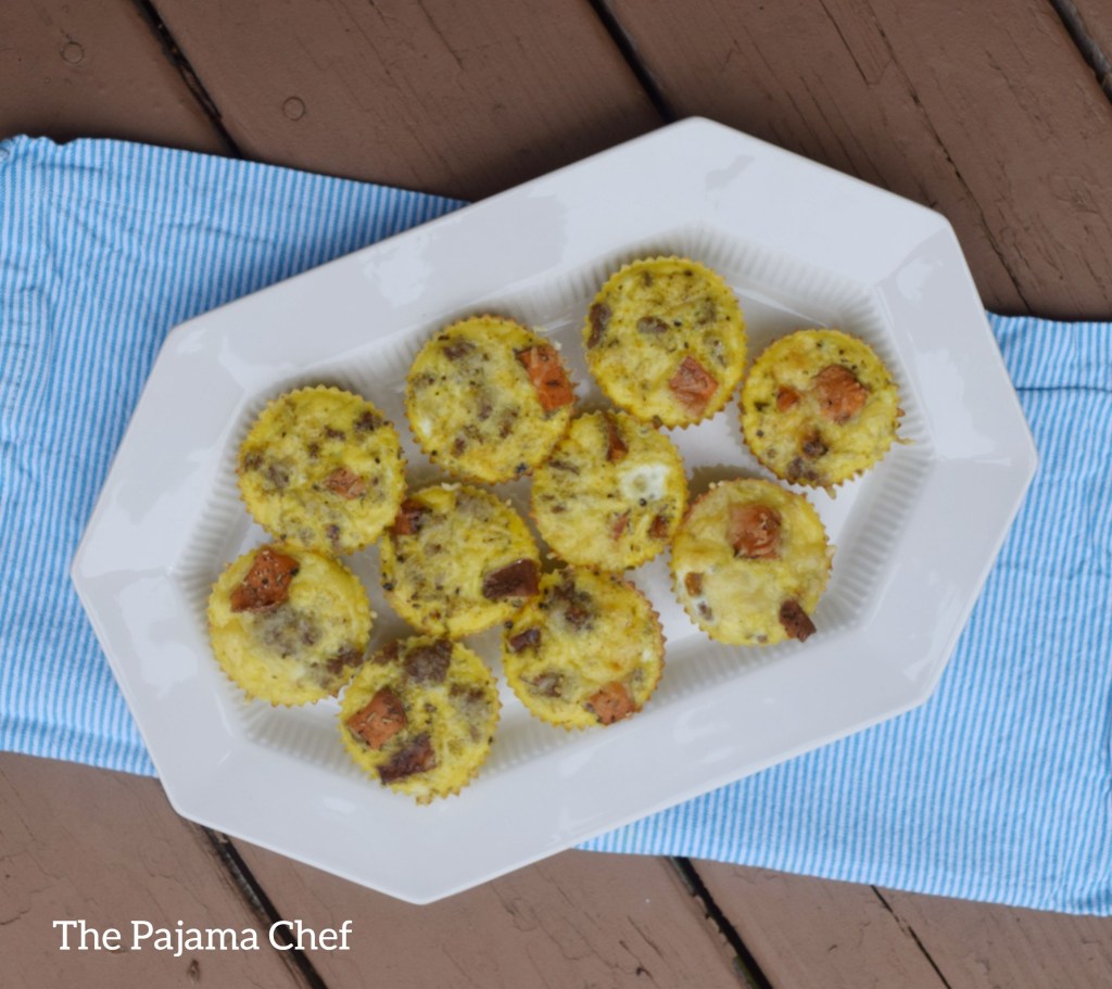Layered sweet potato and sausage scrambled egg muffins to make your mornings better! These little treats are so flavorful and delicious. They're toddler approved and freeze great!