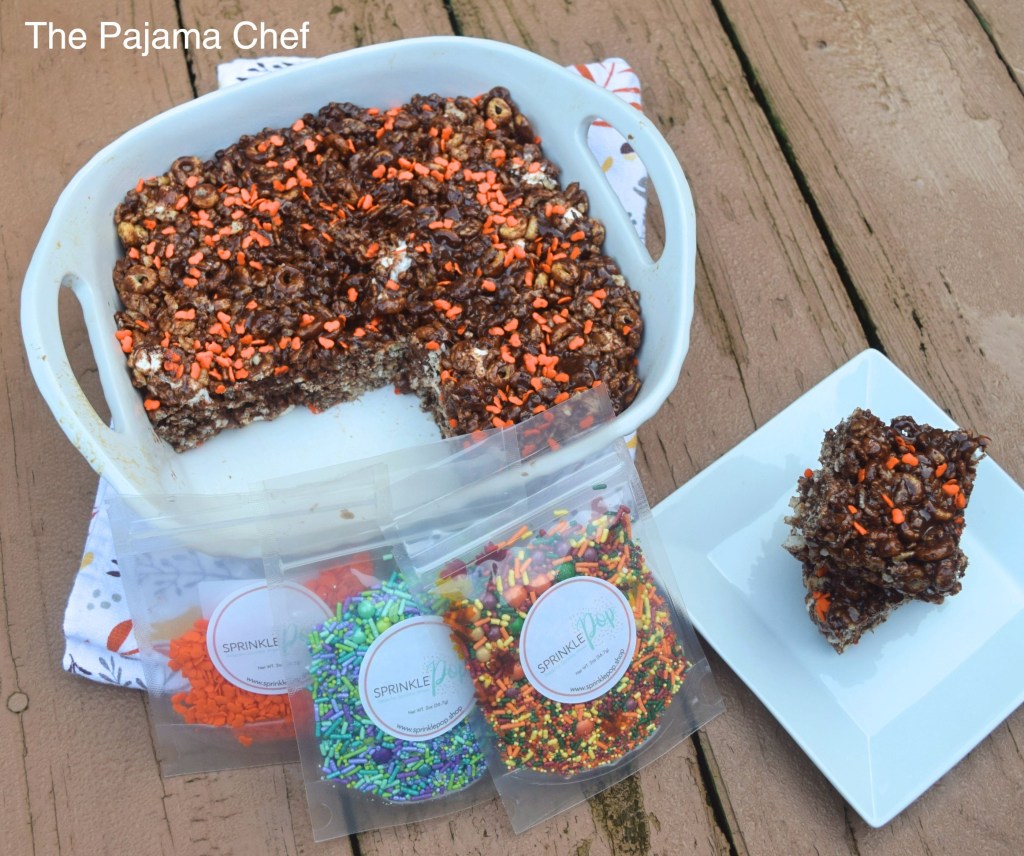 Chocolate. Sprinkles. Pumpkin. Marshmallows. What's not to love?? These yummy cereal treats are made with Sprinkle Pop sprinkles for #Choctoberfest and are oh-so-fun!